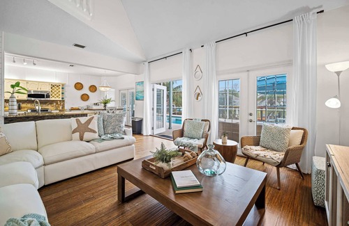 Palm Harbor House | Elegant Canal Home with Heated Pool