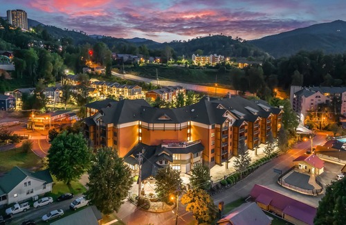 Gatlinburg Condo | Elegant condo downtown w/free attraction tickets, fireplace & hot tub/pool