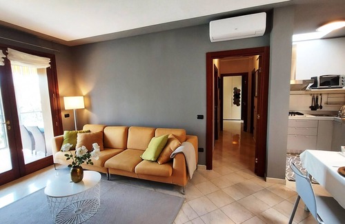 Desenzano del Garda Apartment | Elegant flat with large terrace in residence with swimming pool