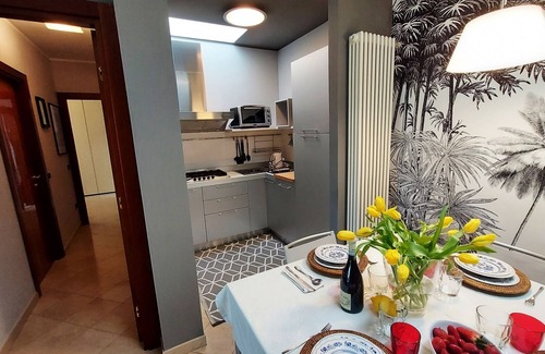 Desenzano del Garda Apartment | Elegant flat with large terrace in residence with swimming pool