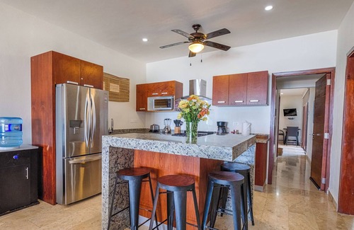 Akumal Condo | Elegant ground level beachfront condo with pool access, AC and WiFi!