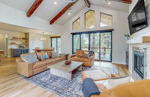 Torreon House | Elegant home with expansive patio and fireplace with golf nearby