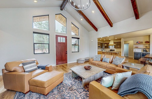 Torreon House | Elegant home with expansive patio and fireplace with golf nearby
