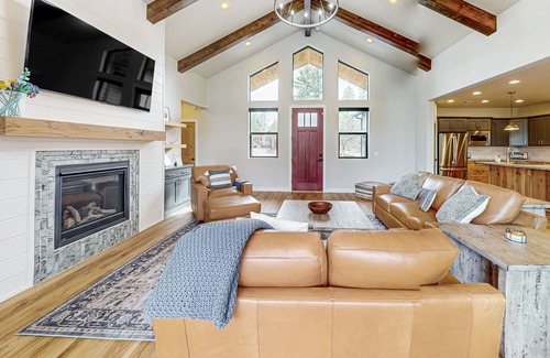 Torreon House | Elegant home with expansive patio and fireplace with golf nearby