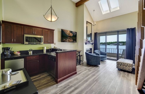 Charlevoix Condo | Elegant Lake Charlevoix Views | Downtown Charlevoix | Pool, Hot Tub, Sauna