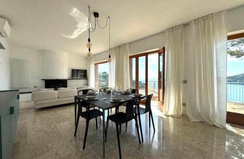 Portovenere Apartment | Elegant modern and bright flat with splendid terrace overlooking the sea and Palmaria Island Modern designer interior accommodates up to six people