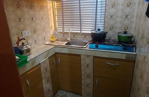Alimosho Apartment | Elegant Sitting room and Bedroom with AC in vibrant Lagos, Nigeria
