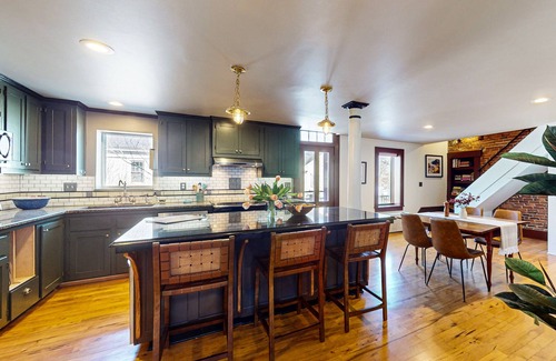 Belfast House | Elegant Victorian Gothic Revival home with wet bar, sunroom, & washer/dryer
