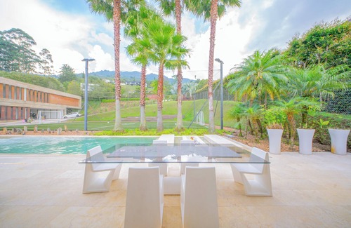 Envigado House | Elite 8BR Luxury Mansion Heated Pool Chef Maid Movie Theater Soccer Field Club