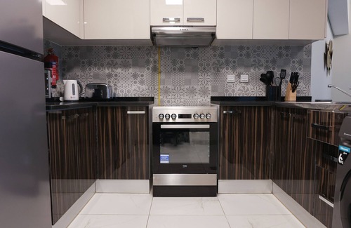 Dubai Apartment | Elite LUX Holiday Homes - Cozy & Modern 1BR in Dubai South
