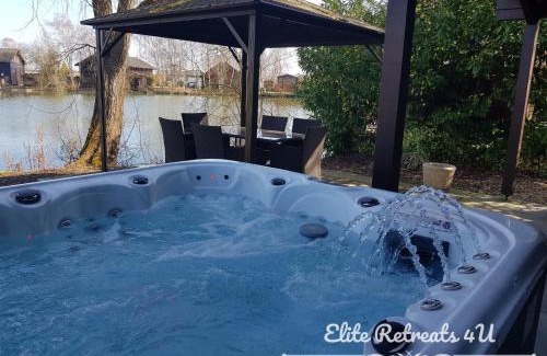 Tattershall House | Elite Retreats 4U Lakeside Hot Tub Log Cabin at Tattershall Lakes Park
