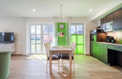 Greetsiel Apartment | Ella - Moderne und Komfortable Ferienwohnung mit Sonniger Terrasse