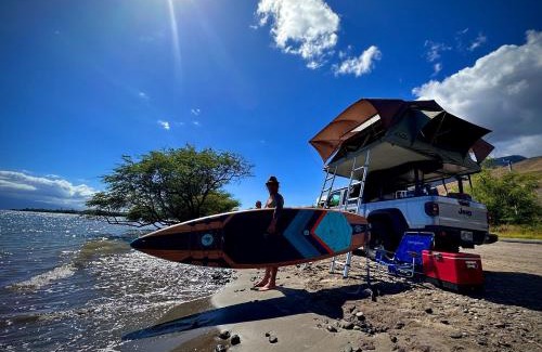 Paia Apartment | Embark on a journey through Maui with Aloha Glamp's jeep and rooftop tent allows you to discover diverse campgrounds, unveiling the island's beauty from unique perspectives each day