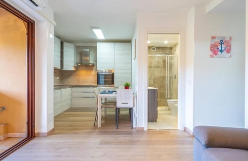 Portisco Apartment | Emerald Green