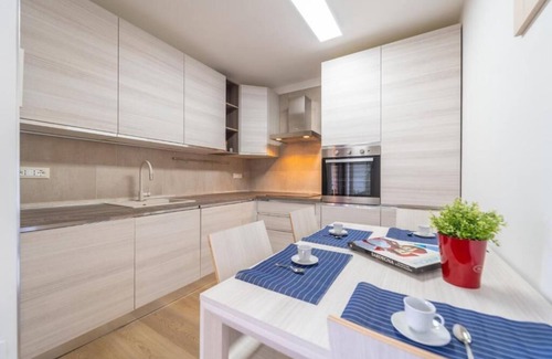 Portisco Apartment | Emerald Green
