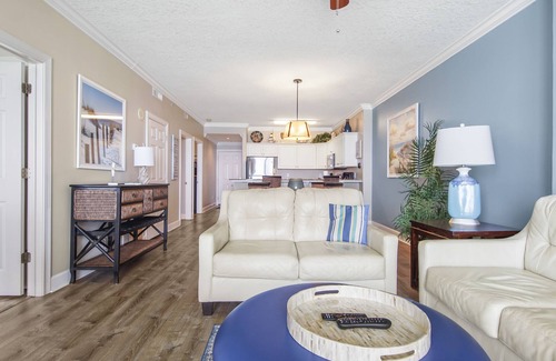 West Panama City Beach Condo | Emerald Isle 1305 - Front row beach chair service included! Affordable rates!
