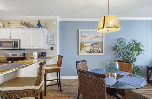 West Panama City Beach Condo | Emerald Isle 1305 - Front row beach chair service included! Affordable rates!