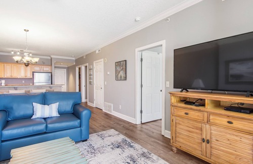 West Panama City Beach Condo | Emerald Isle 1306 - Front row beach chair service included! Affordable rates!