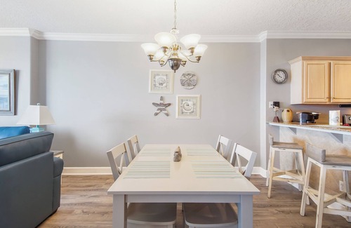 West Panama City Beach Condo | Emerald Isle 1306 - Front row beach chair service included! Affordable rates!