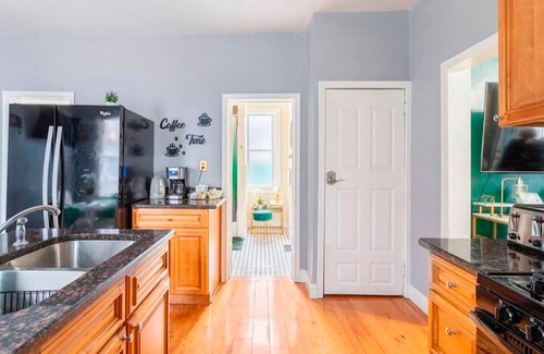 Tremont House | Emerald Oasis: Stylish Tremont 2BR Lower Unit by Christmas Story House | Parking 7 Min to Downtown
