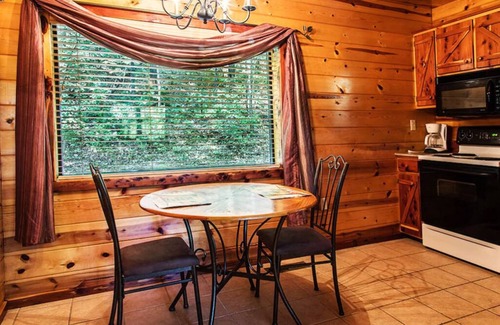 Eureka Springs Cabin | Enchanted Forest Hilltop Hideaway- 1 bedroom Cabin with Jacuzzi tub! Hiking Trail & Cave on property!