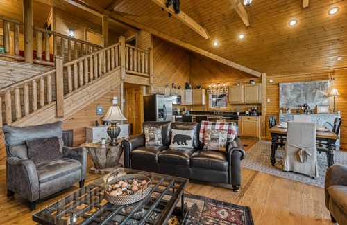 Gatlinburg - Pigeon Forge Cabin | Enchanting cabin retreat w/hot tub & amazing deck views +free attraction tickets