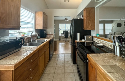 Haile Plantation House | Enchanting dog-friendly home with fenced yard - near trails