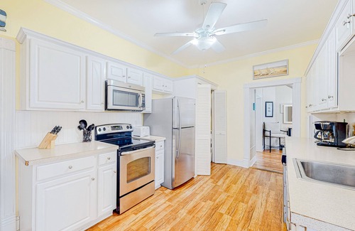Ocean City House | Enchanting home with enclosed yard, patio, grill, hammock, & washer/dryer