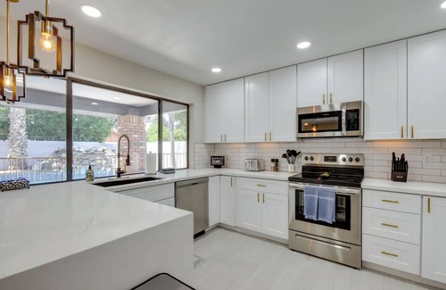 Mesa House | Enchanting Retreat on Encanto St, free Heated Pool