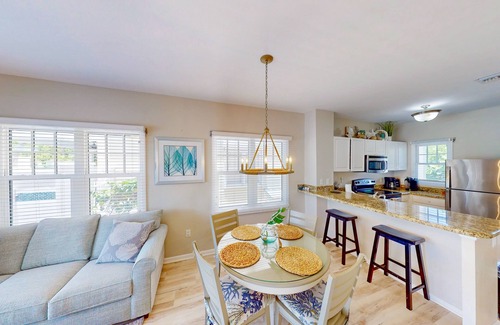 Marathon House | Enchanting waterfront townhouse with balcony, plunge pool, & washer/dryer