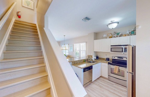 Marathon House | Enchanting waterfront townhouse with balcony, plunge pool, & washer/dryer