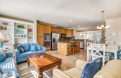 Sunset Island House | End townhome w/partial bay view - steps to resort pools, beach & clubhouse
