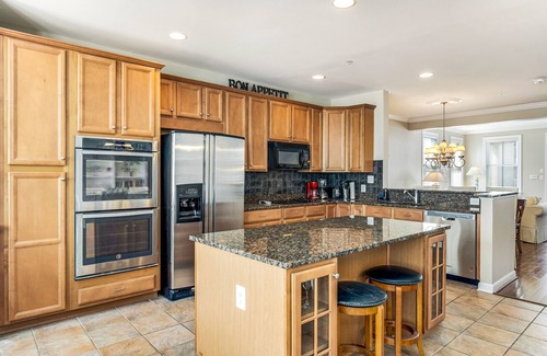 Sunset Island House | End townhome w/partial bay view - steps to resort pools, beach & clubhouse