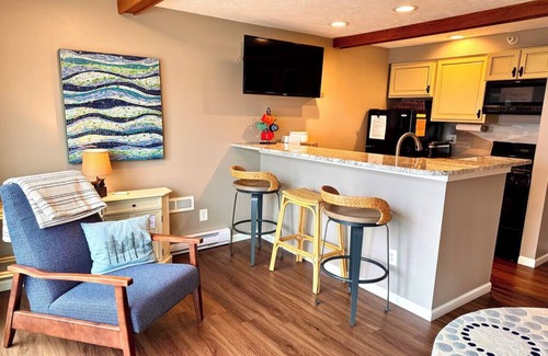 Onekama Condo | ENJOY 2 LAKES: NEW Portage Lakefront condo w/2 Kayaks, walk to Lake Michigan!