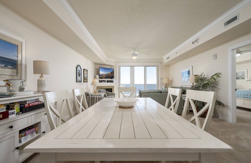 Ocean City Condo | Enjoy a large, spacious designer unit with all the extras plus an indoor pool, outdoor pool, fitness room, assigned parking and shops on the ground level.