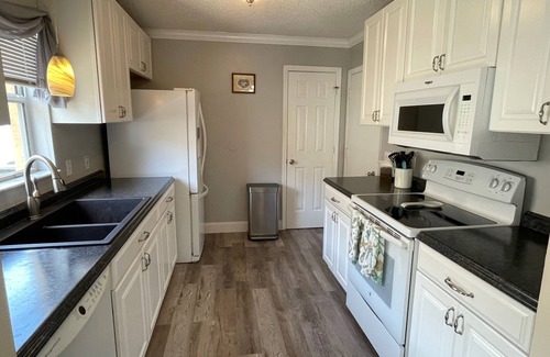 San Pedro Villas House | Enjoy a private pool, spacious lanai, and cozy Florida room with Murphy bed!