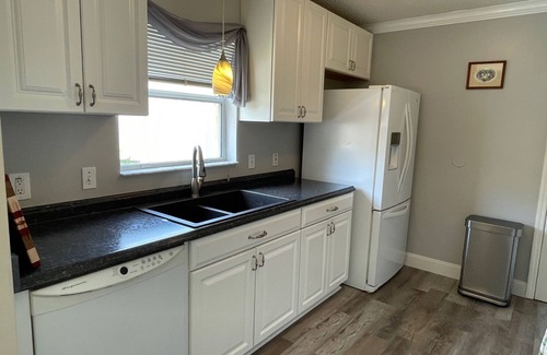 San Pedro Villas House | Enjoy a private pool, spacious lanai, and cozy Florida room with Murphy bed!