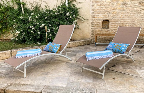 Raix House | Enjoy a relaxing vacation in this inviting vacation home with pool.