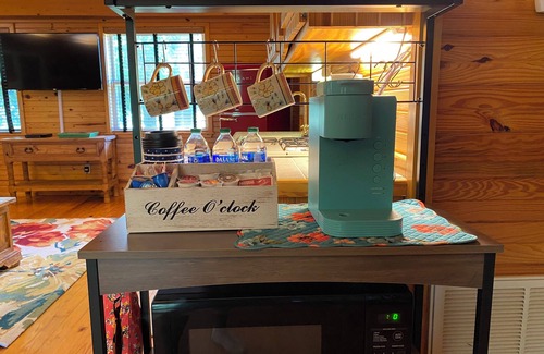 Pleasant Grove Cabin | Enjoy a warm fire! Fish in the lake or river, relax in the Outhouse Lounge