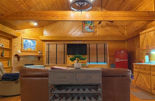 Pleasant Grove Cabin | Enjoy a warm fire! Fish in the lake or river, relax in the Outhouse Lounge