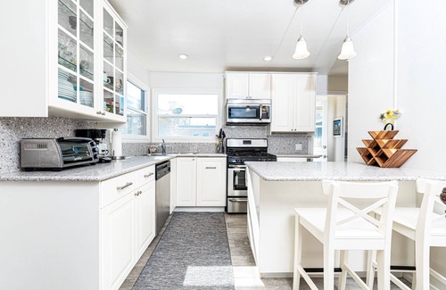 Balboa Peninsula Condo | Enjoy Amazing Views of the Harbor, From the Coolest Patio in Town!
