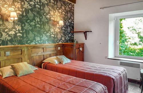 Le Ponthou House | Enjoy an unforgettable time in this idyllically located vacation home with outdoor hot tub.