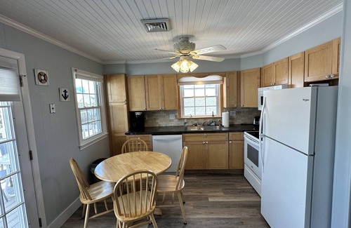 Midtown Ocean City Condo | Enjoy Ocean views from your top unit furnished porch Free linens