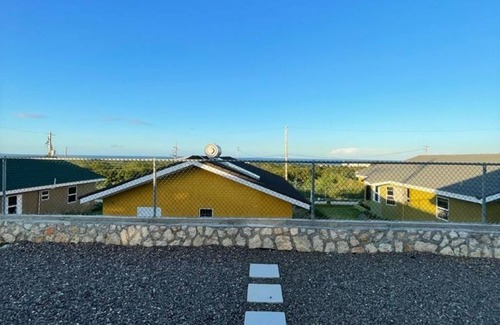 Falmouth House | Enjoy peace and serenity in this lovely home boasting sea view