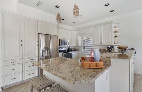 Falcons Glen House | Enjoy Players Club Access in this Luxurious Naples Golf Course Home.