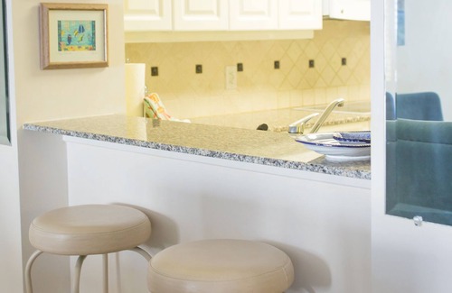 Ono Island Condo | Enjoy premier views of sugar sand beach and glorious sunsets on a huge balcony
