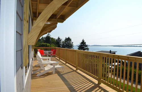 Mid-Coast and Islands House | Enjoy spectacular sunset and water views from the deck and balconies with water access.