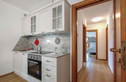 Venegazzu House | Enjoy the view of beautiful vineyards from this semi-detached house.