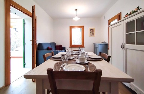 Venegazzu House | Enjoy the view of beautiful vineyards from this semi-detached house.