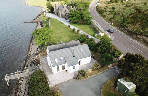 Sleat House | Enjoy the spectacular and tranquil waterfront setting of the Boathouse.